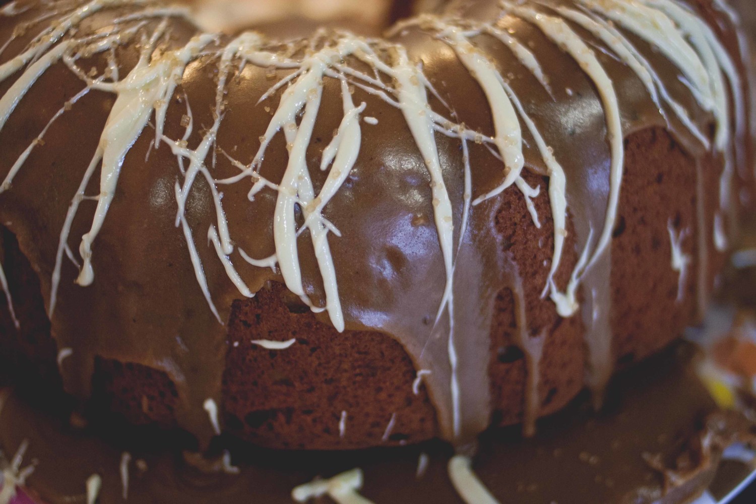 Spiced sweet potato pound cake w/ brown sugar glaze + white chocolate drizzle